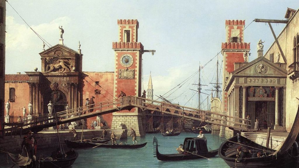 Arsenale di Venezia con le torri, un ponte di legno e gondole sull'acqua